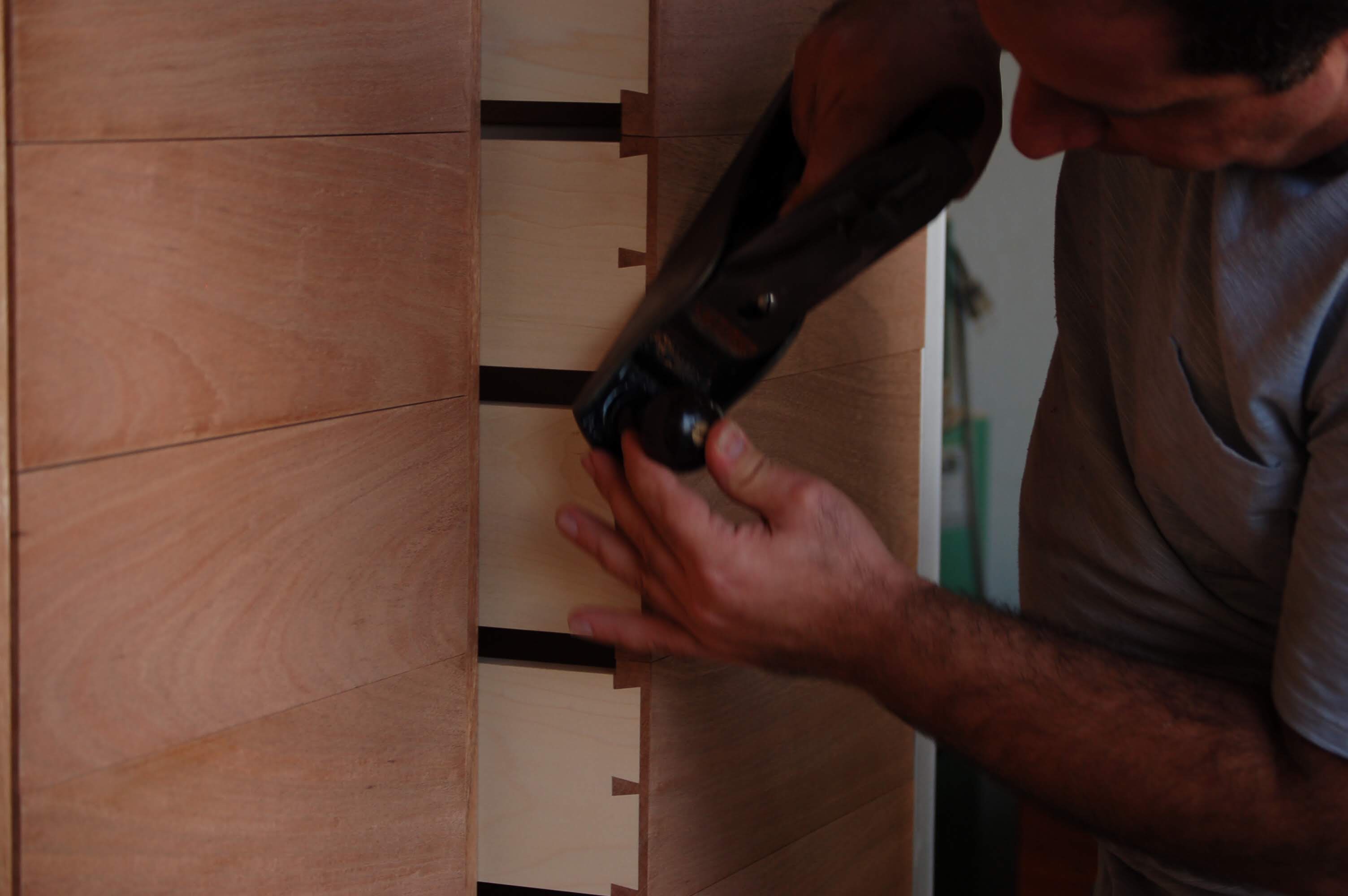 jake%20gevorgian%20planing%20a%20stack%20of%20drawer%20edges.jpeg